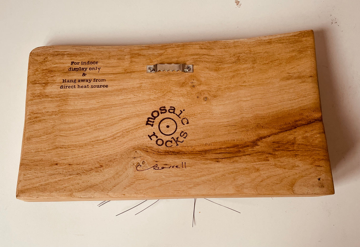 Grey Lurcher Dog on wooden block