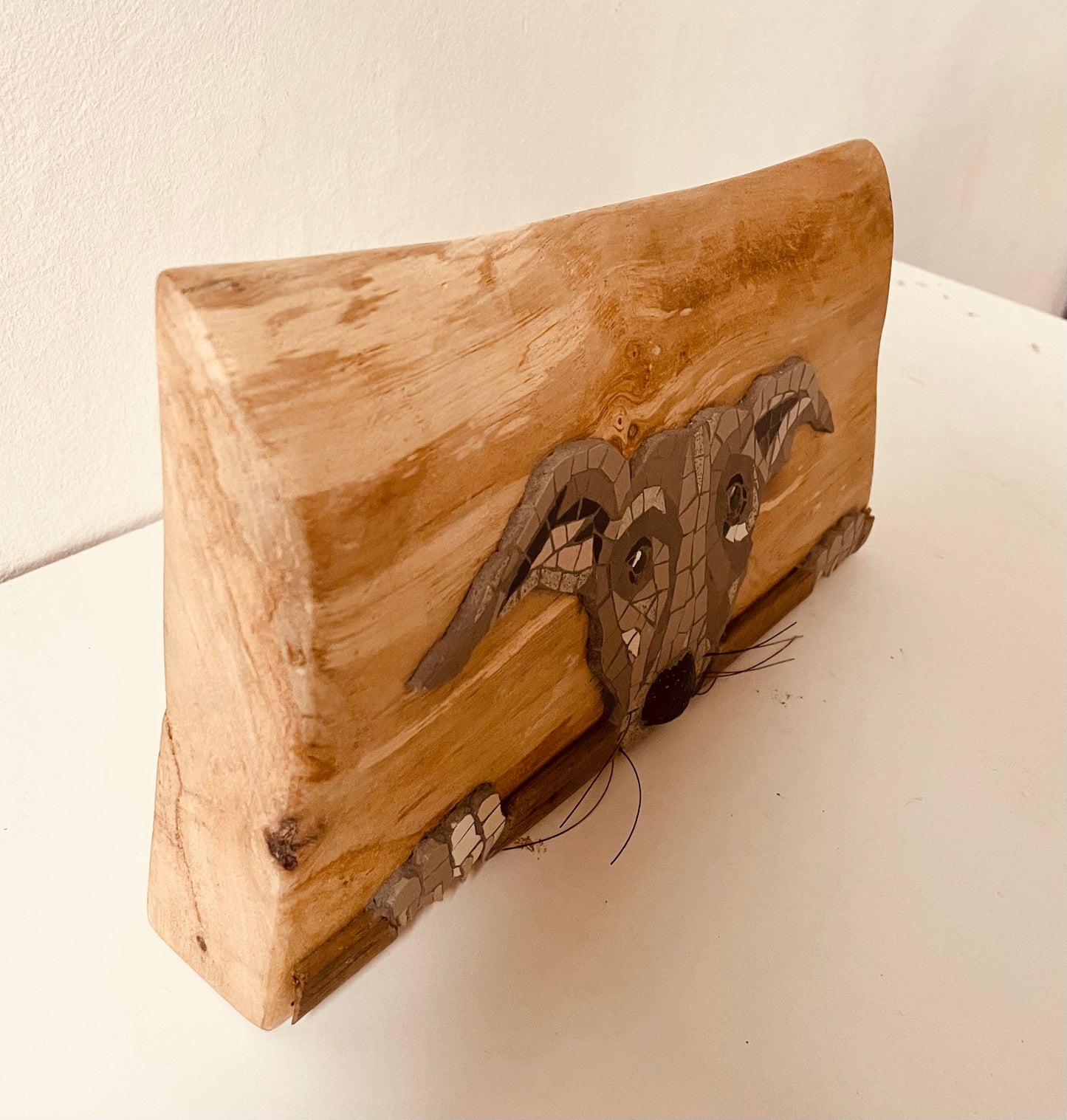 Grey Lurcher Dog on wooden block