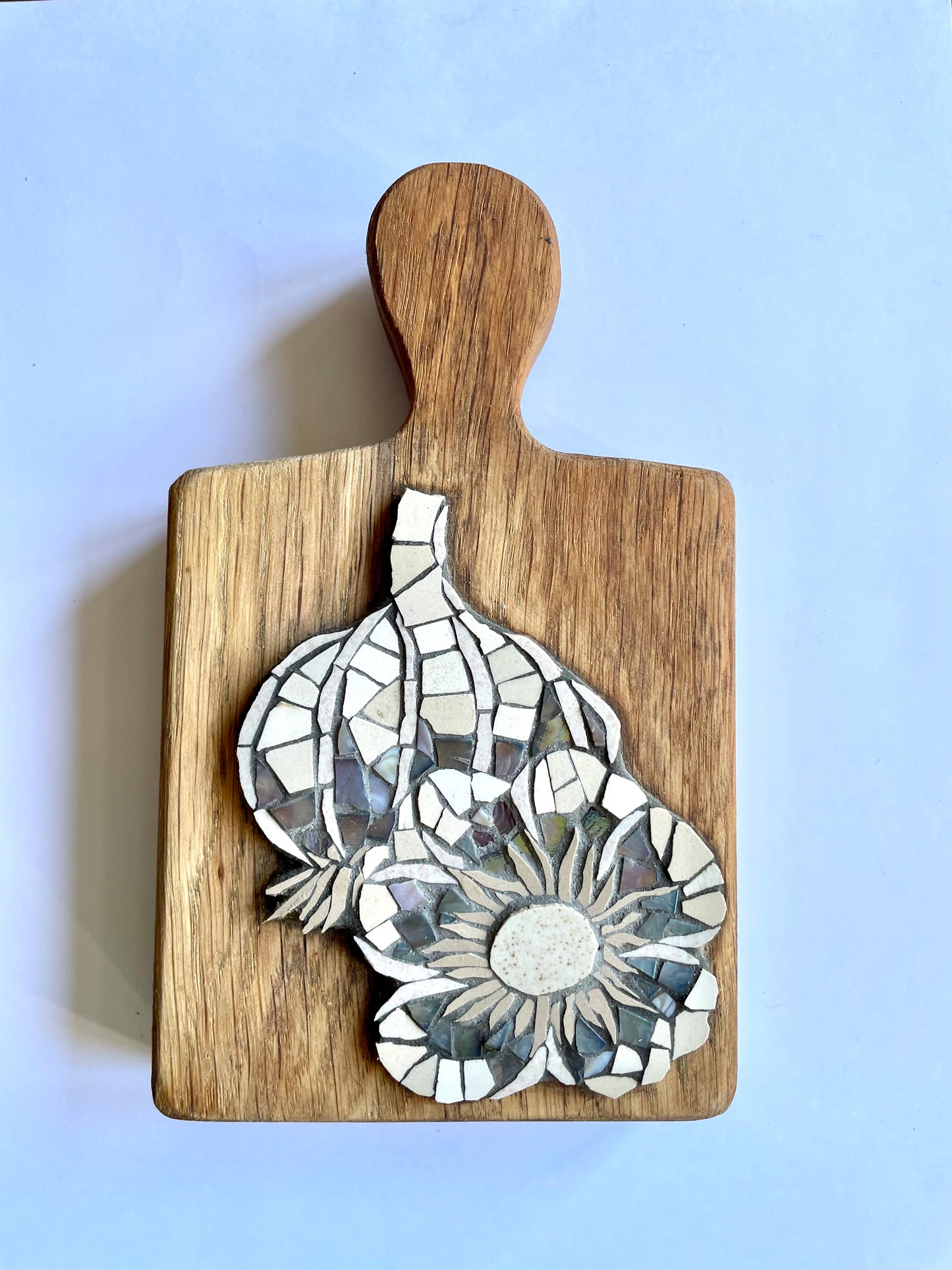 Garlic Bulbs on wooden board