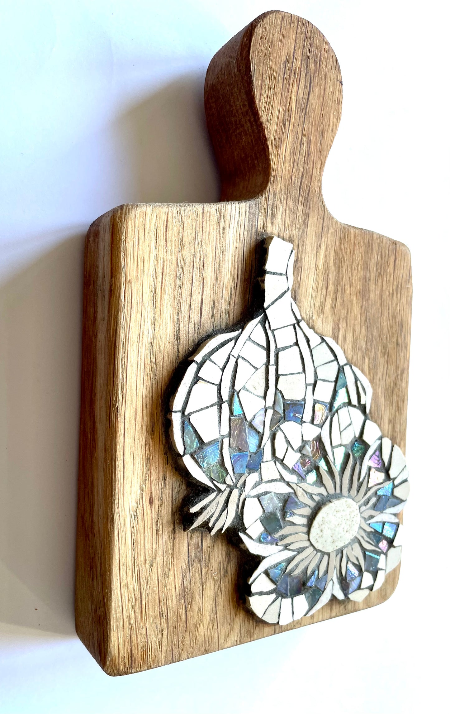 Garlic Bulbs on wooden board