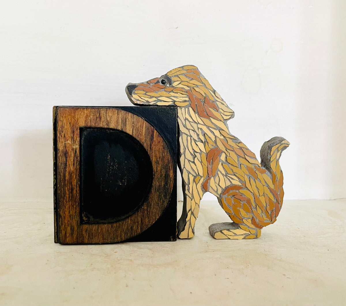 Sitting Dog on Vintage wooden Letter press D