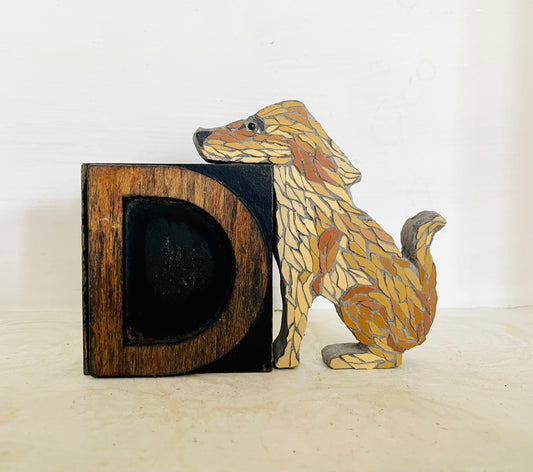 Sitting Dog on Vintage wooden Letter press D